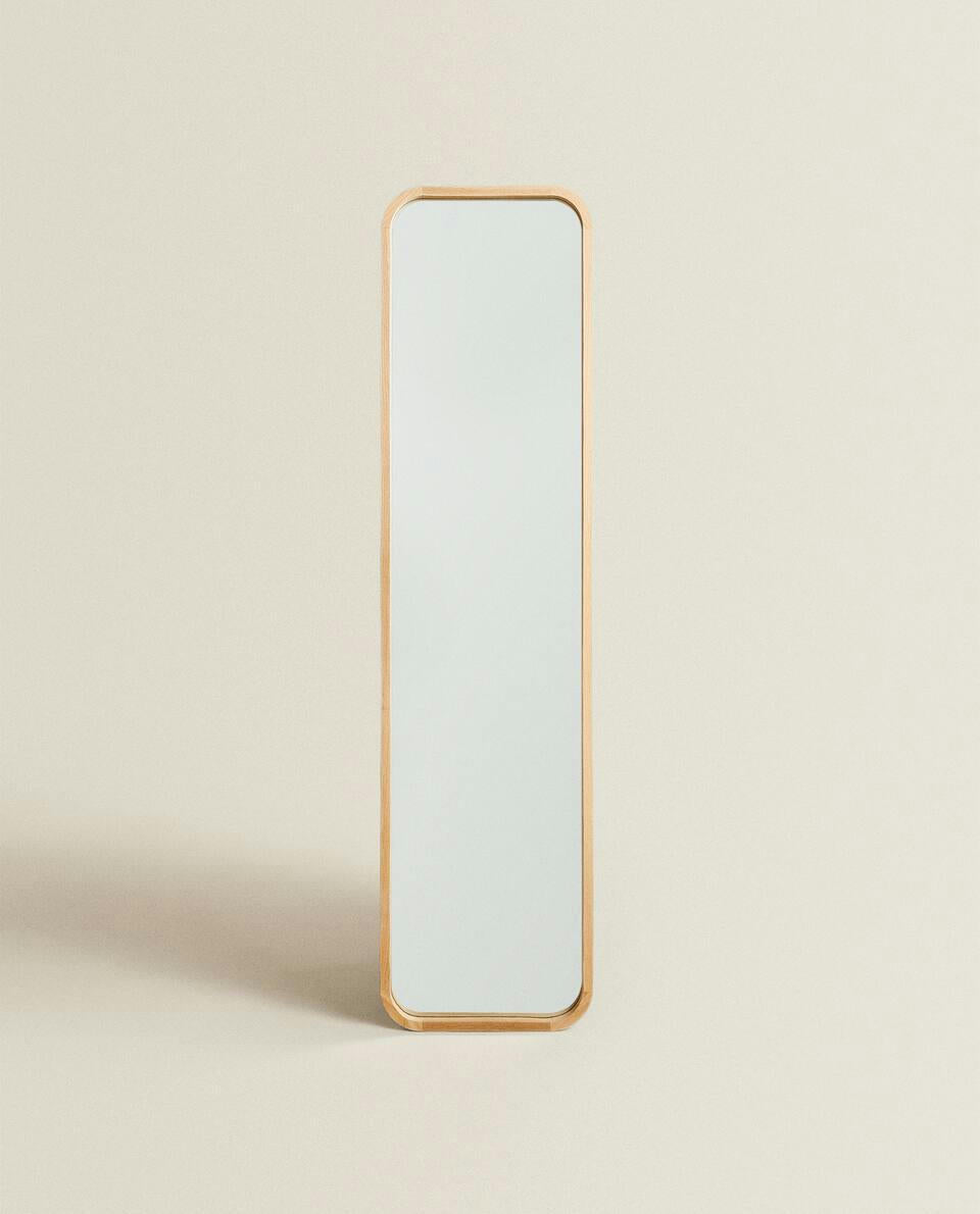 ROUND VERTICAL MIRROR WITH FRAME