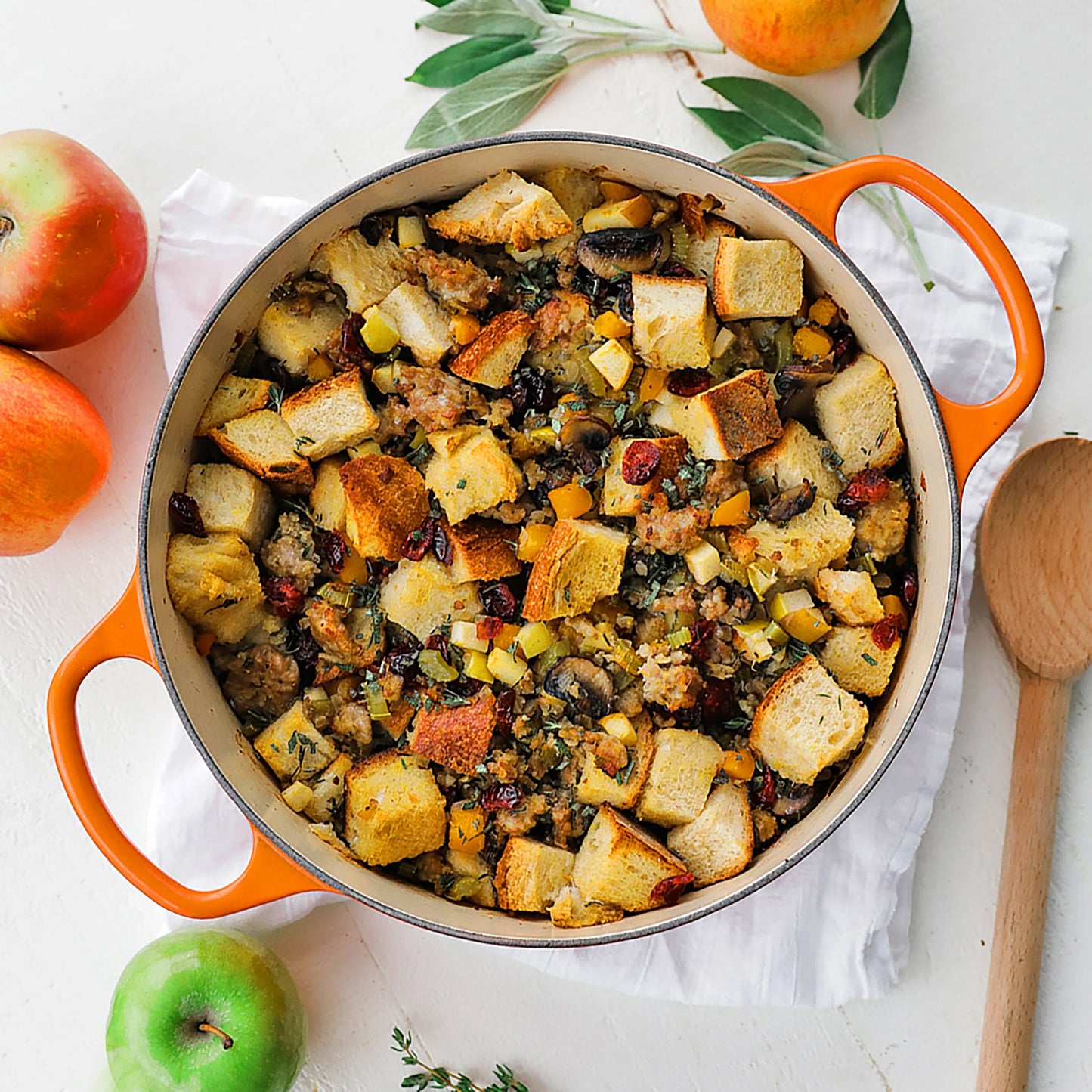 Signature Cast Iron 6.75-quart Flame Round Wide Dutch Oven with Copper Knob