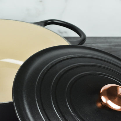 Signature Cast Iron 8-quart Licorice Oval Dutch Oven with Copper Knob