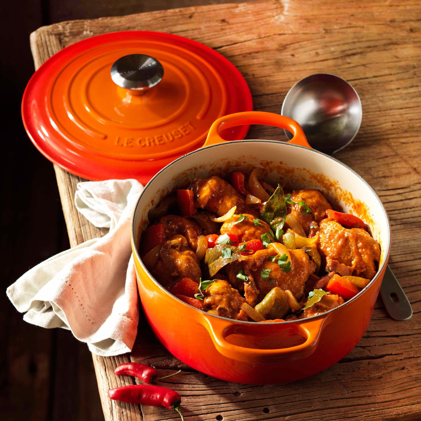Signature Cast Iron 9-quart Flame Round Dutch Oven