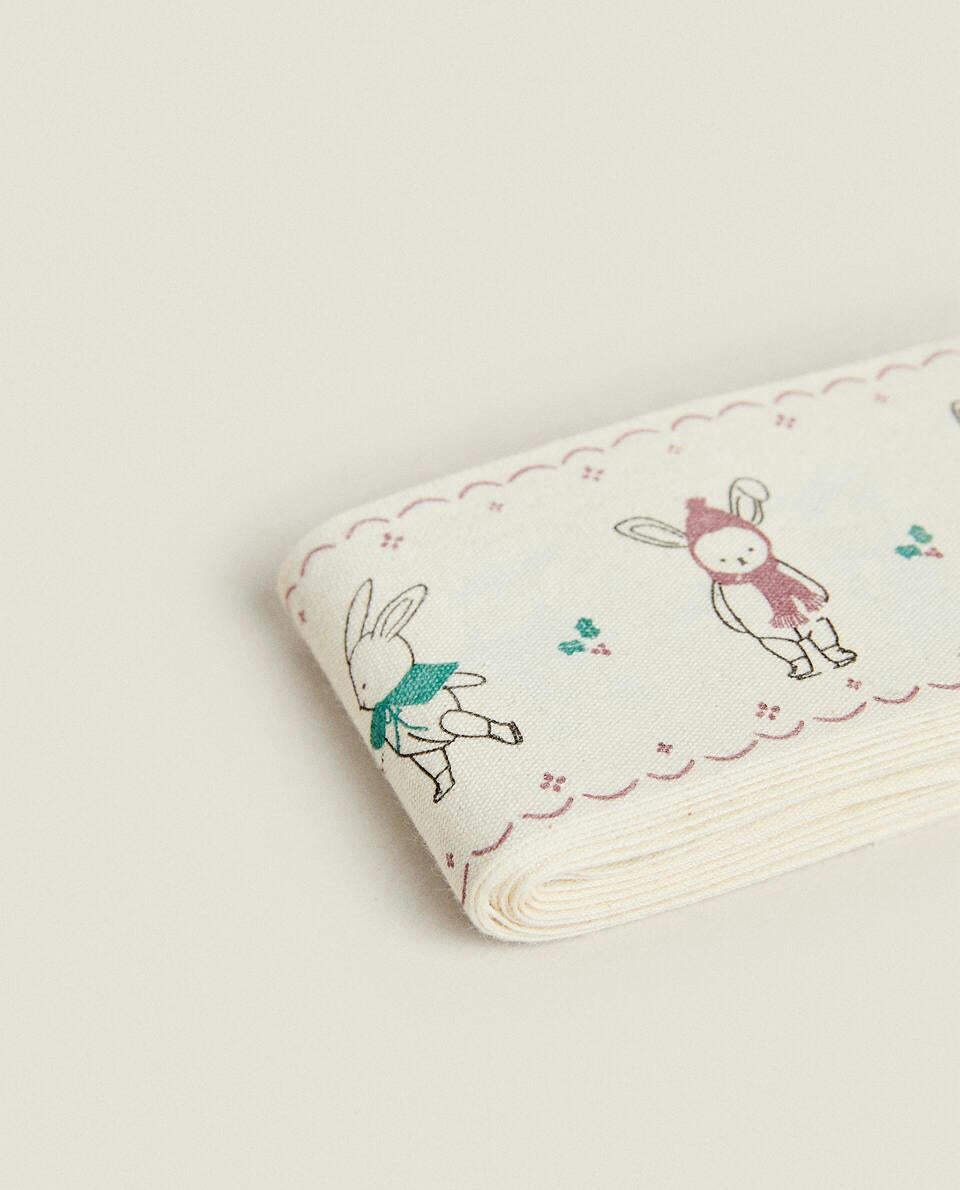 CHILDREN’S WRAPPING PAPER WITH CHRISTMAS BUNNY RABBITS