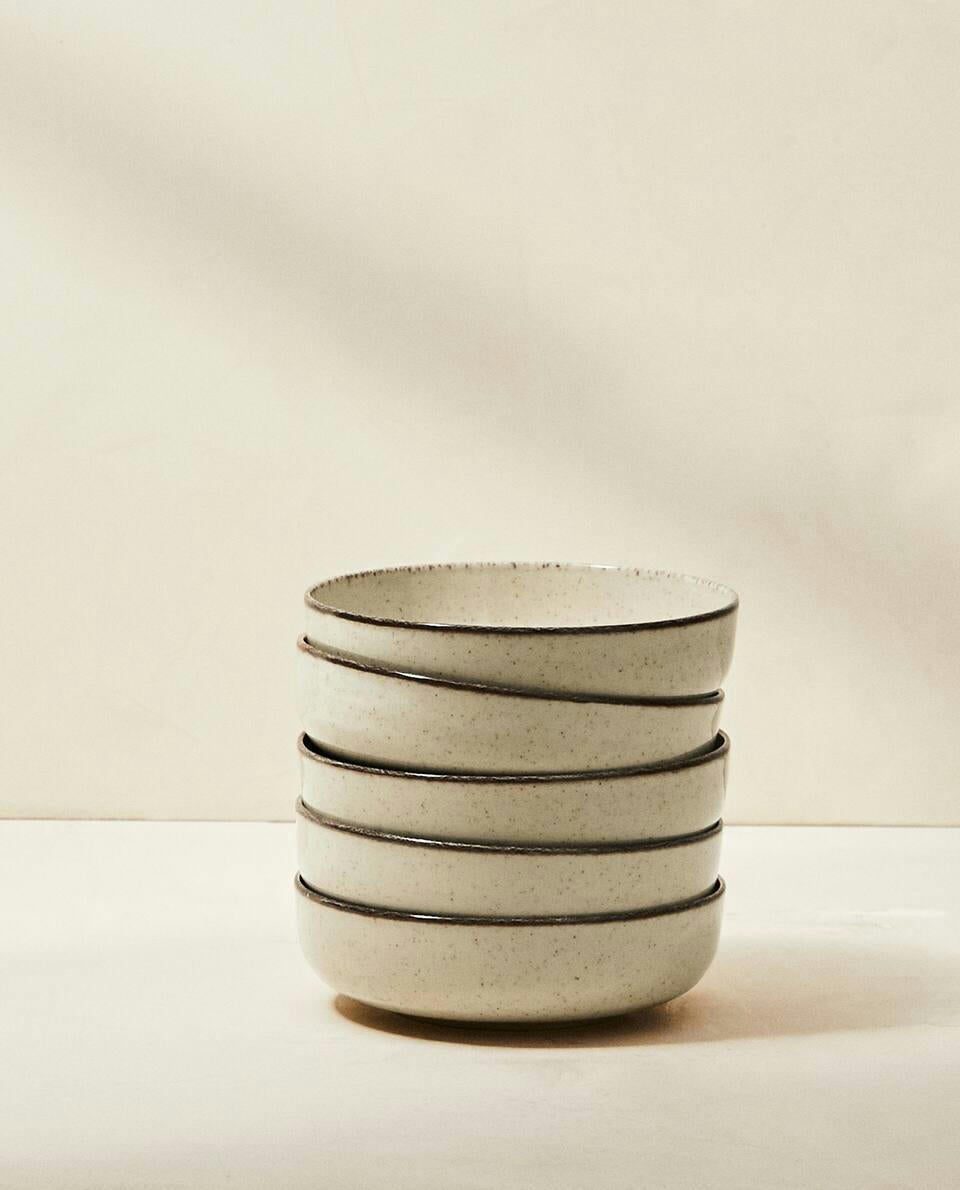 PORCELAIN BOWL WITH ANTIQUE FINISH RIM